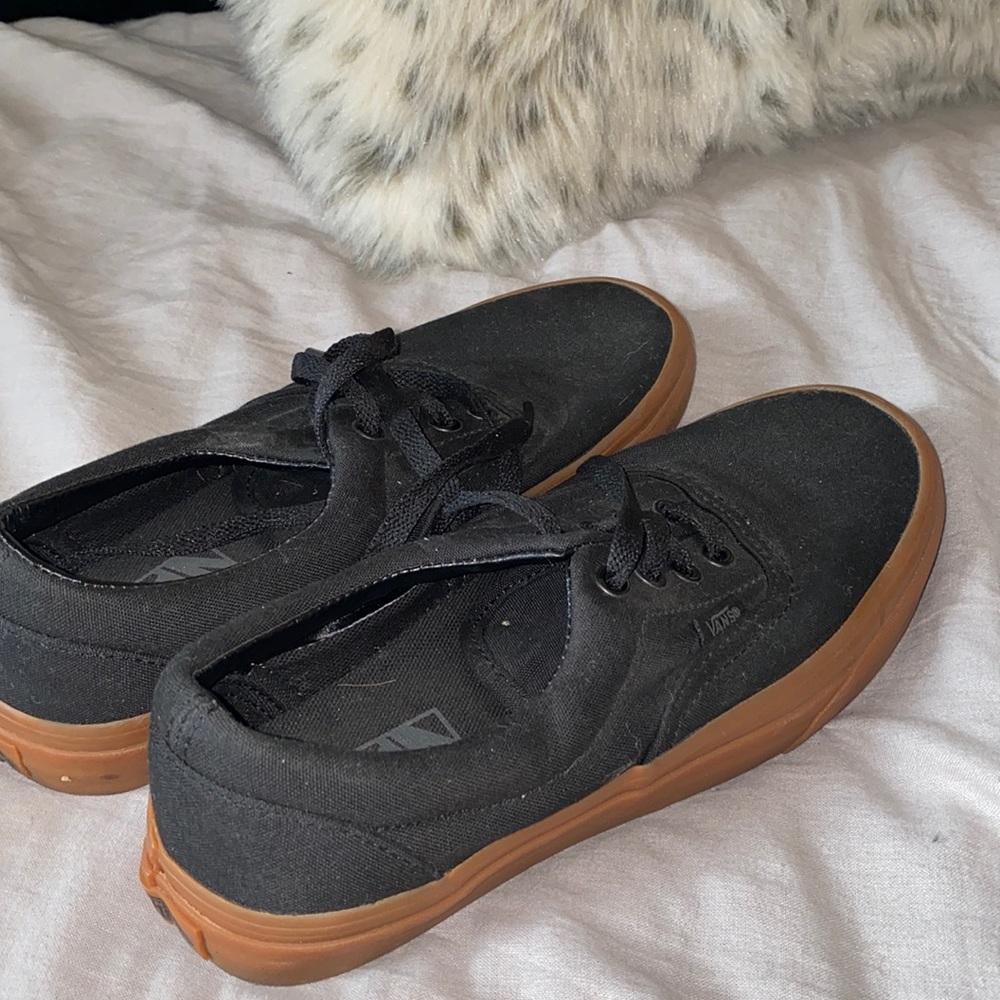 Black and brown lace up vans